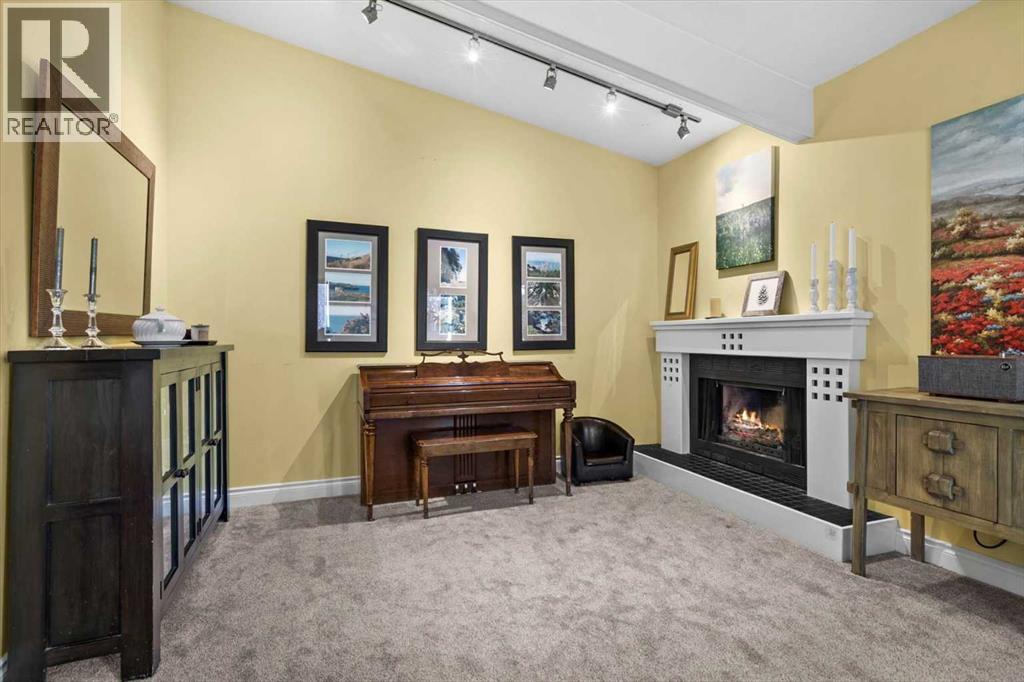 107 Woodford Crescent Sw, Calgary, Alberta  T2W 4C6 - Photo 6 - A2271657