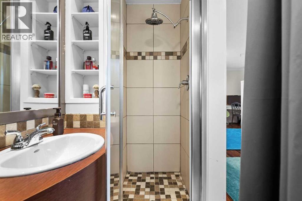 107 Woodford Crescent Sw, Calgary, Alberta  T2W 4C6 - Photo 18 - A2271657