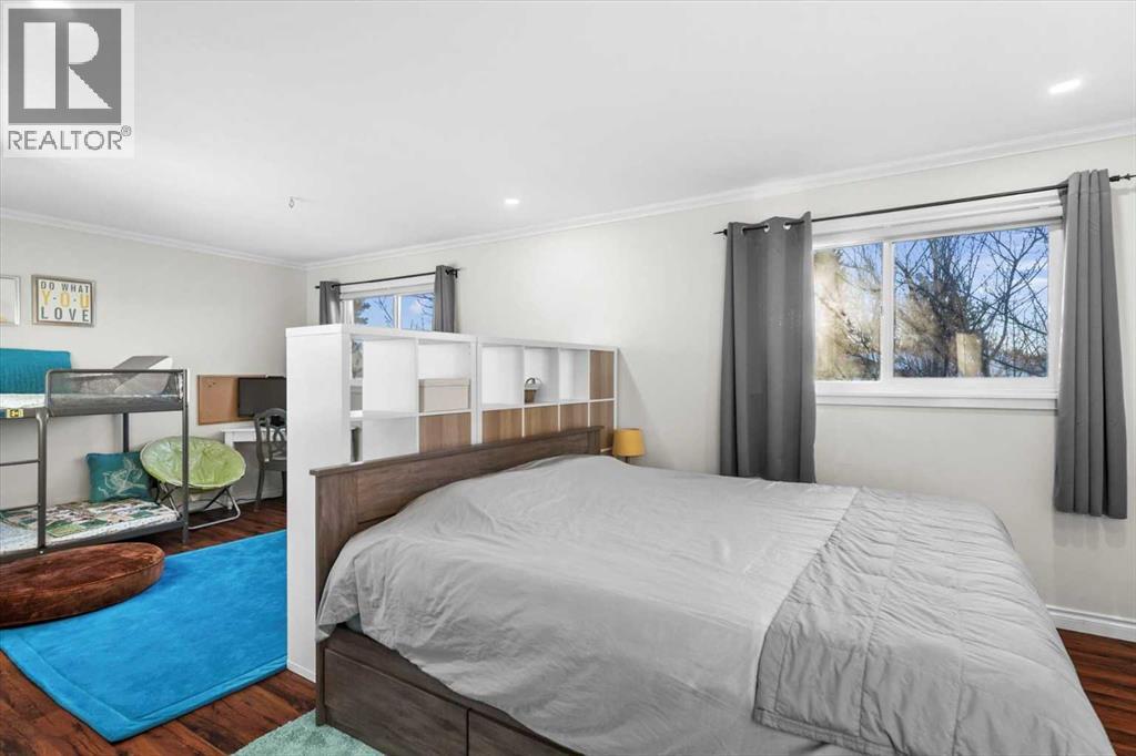 107 Woodford Crescent Sw, Calgary, Alberta  T2W 4C6 - Photo 16 - A2271657