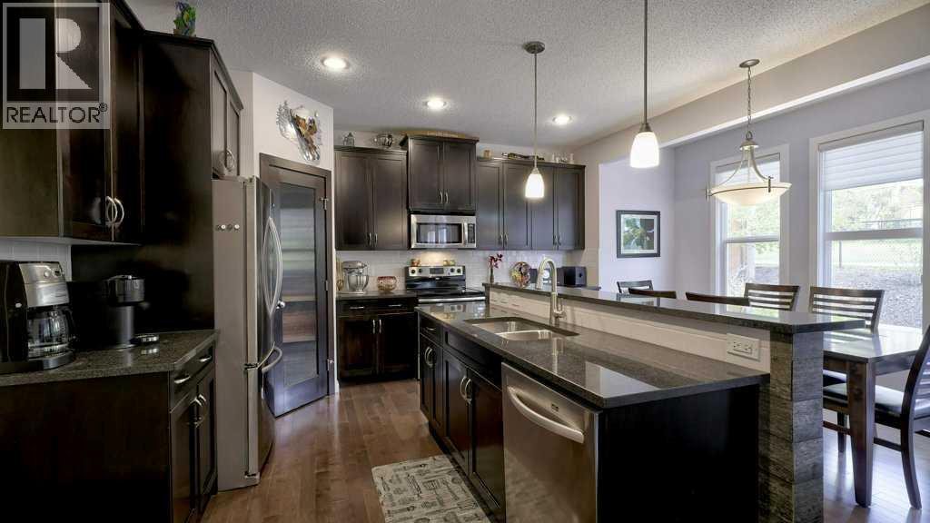244 Heritage Bay, Cochrane, Alberta  T4C 0L3 - Photo 8 - A2235147