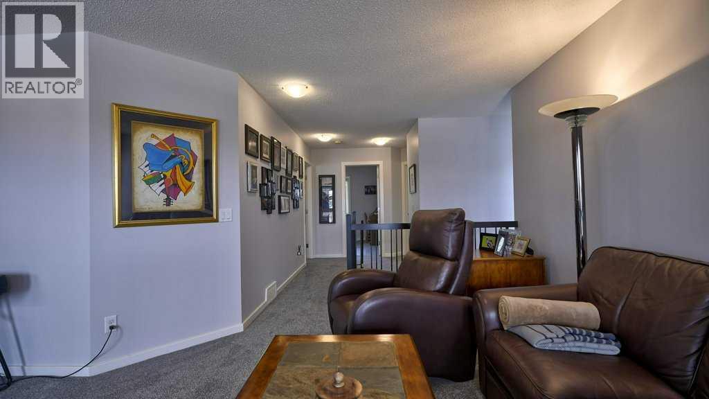 244 Heritage Bay, Cochrane, Alberta  T4C 0L3 - Photo 21 - A2235147