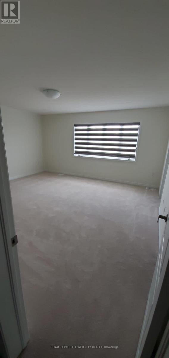 24 Herrick Drive, Brampton, Ontario  L7A 5G2 - Photo 2 - W12568290