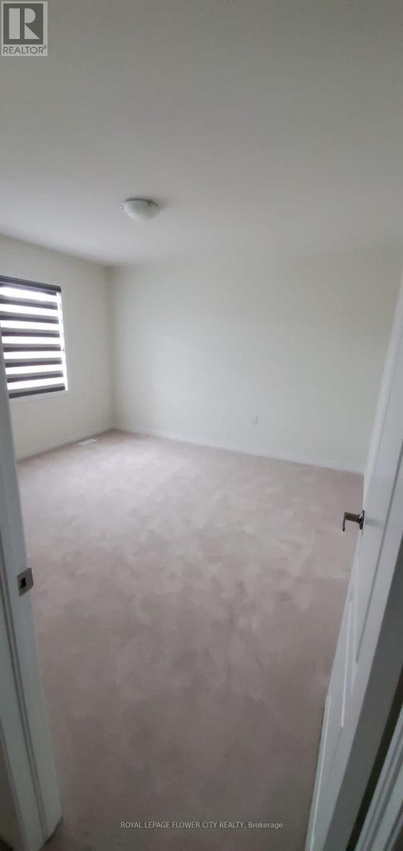 24 Herrick Drive, Brampton, Ontario  L7A 5G2 - Photo 4 - W12568290