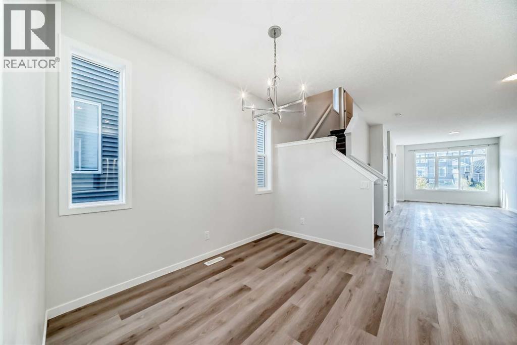 36 Edith Gate Nw, Calgary, Alberta  T3R 1Z2 - Photo 5 - A2261503