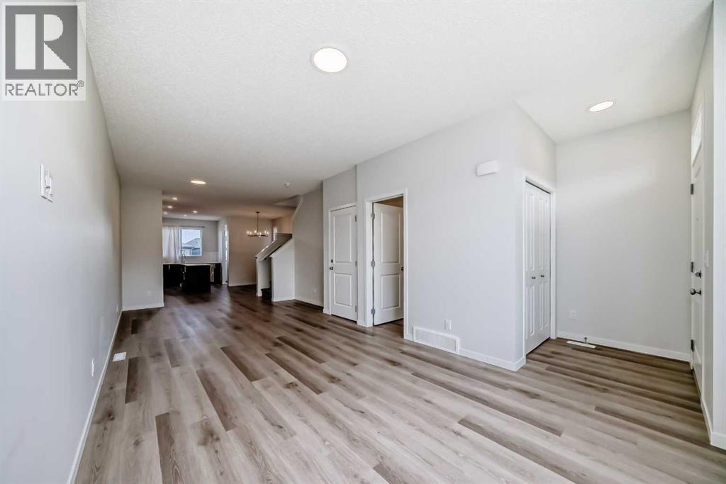 36 Edith Gate Nw, Calgary, Alberta  T3R 1Z2 - Photo 6 - A2261503