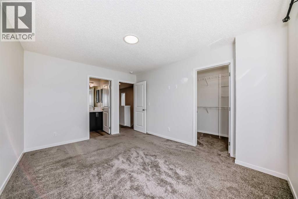 36 Edith Gate Nw, Calgary, Alberta  T3R 1Z2 - Photo 22 - A2261503