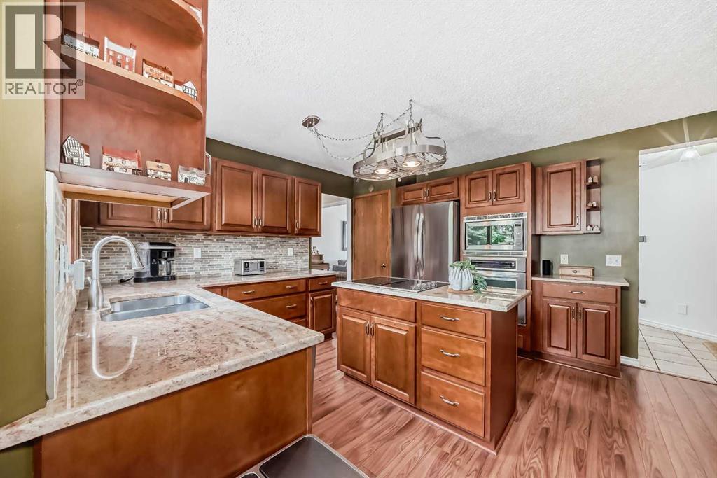 164 Woodfield Road Sw, Calgary, Alberta  T2W 3V9 - Photo 8 - A2261675