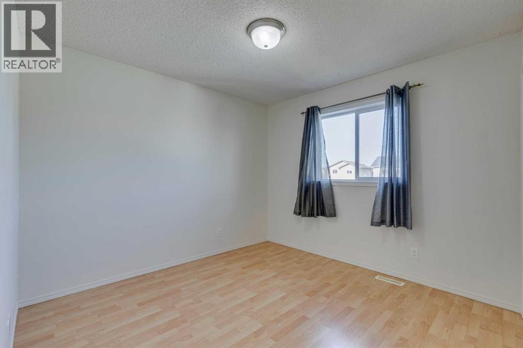 228 Luxstone Place Sw, Airdrie, Alberta  T4B 3C1 - Photo 11 - A2270764