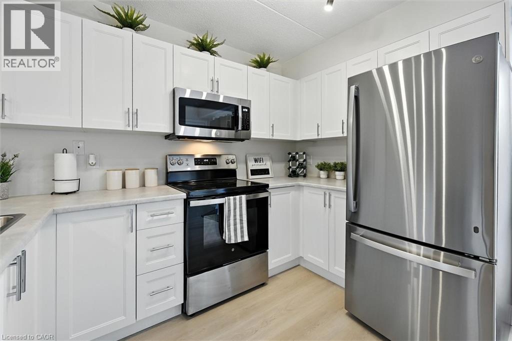 1421 Walkers Line Unit# 102, Burlington, Ontario  L7M 4P4 - Photo 6 - 40766464