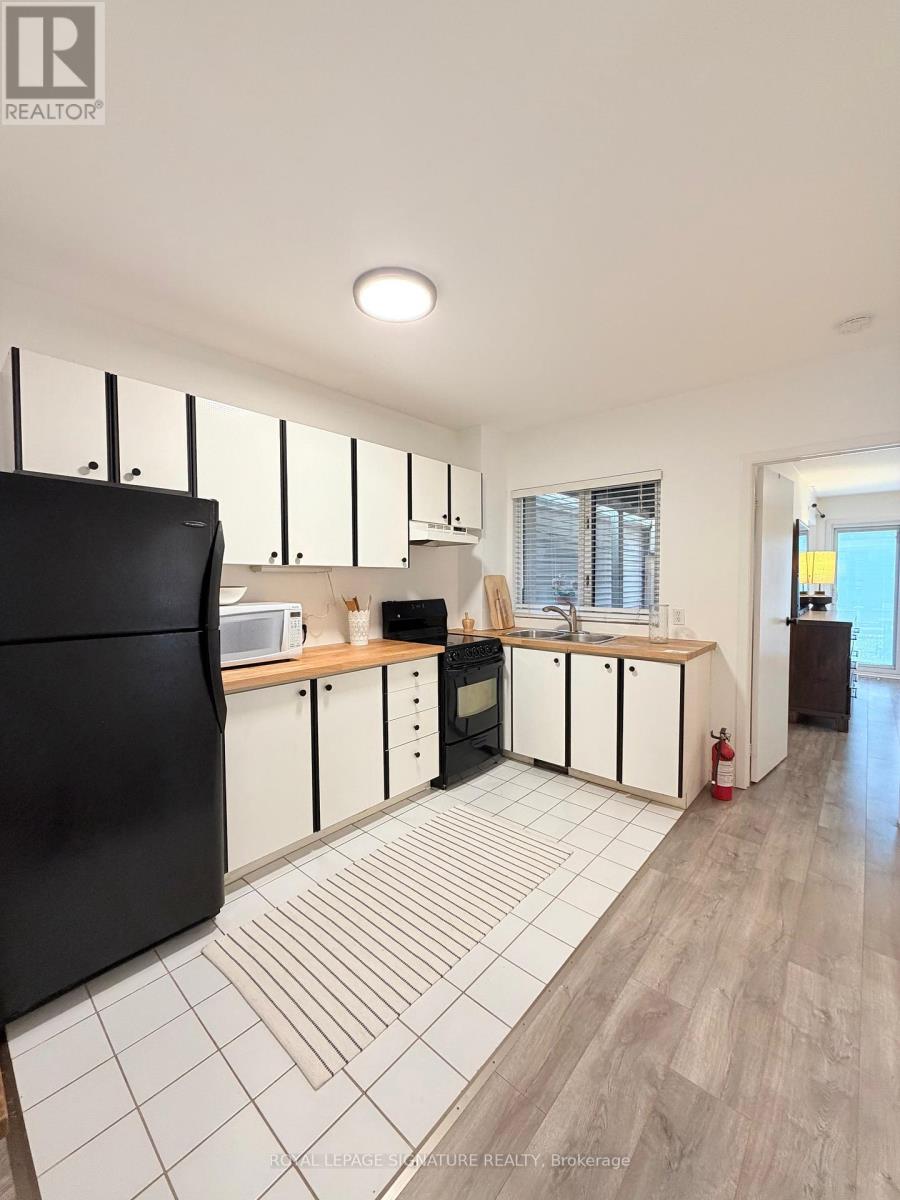 Main - 490 Windermere Avenue, Toronto, Ontario  M6S 3L6 - Photo 11 - W12568482