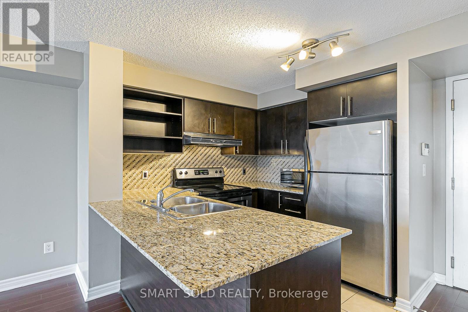 710 - 120 Dallimore Circle N, Toronto, Ontario  M3C 4J1 - Photo 6 - C12568760