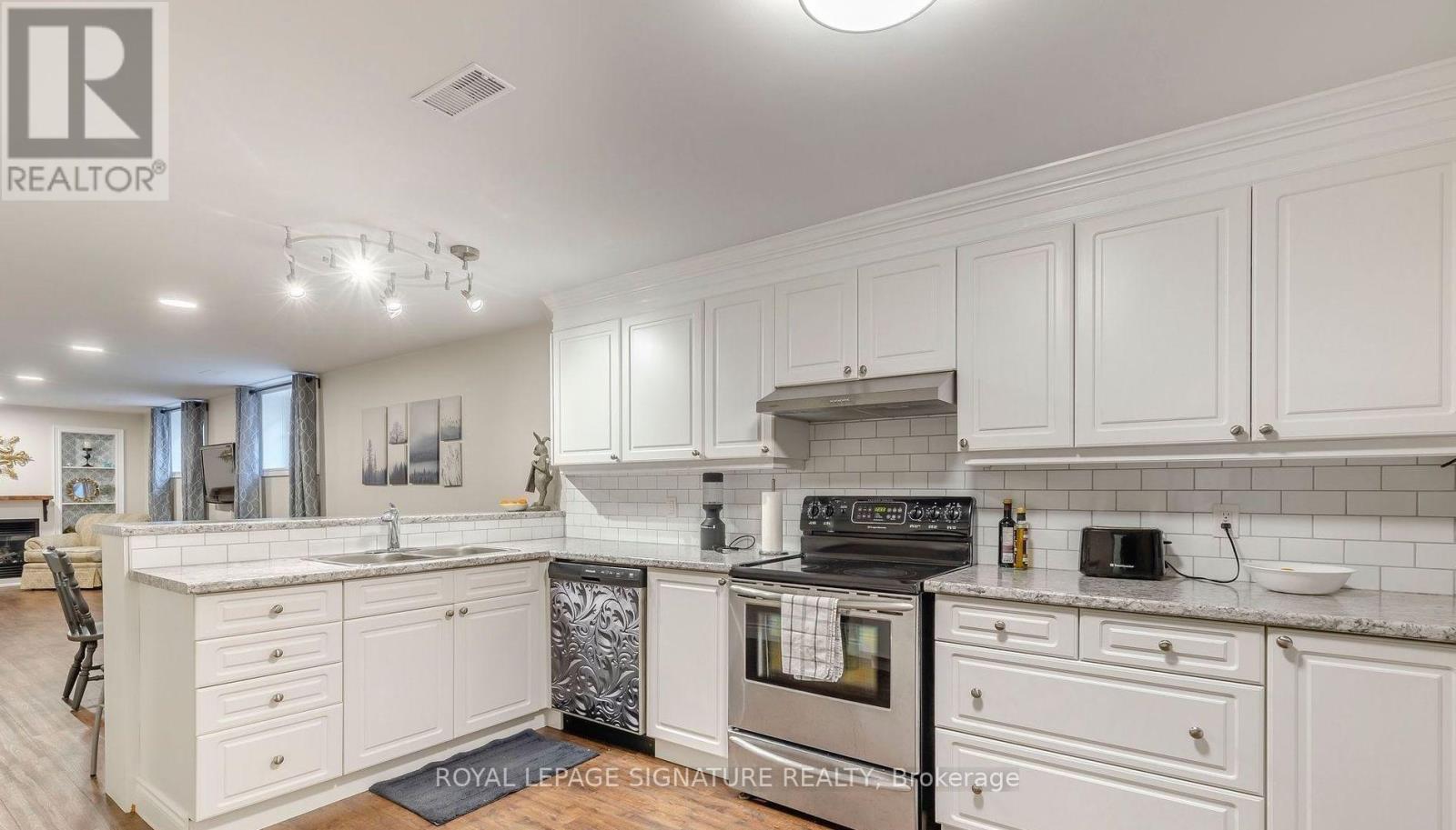 Lower - 10 Duval Drive, Barrie, Ontario  L4M 6V2 - Photo 5 - S12568858