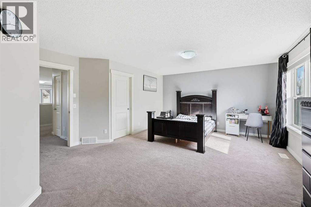 217 Coopers Grove Sw, Airdrie, Alberta  T2B 0G4 - Photo 24 - A2267001