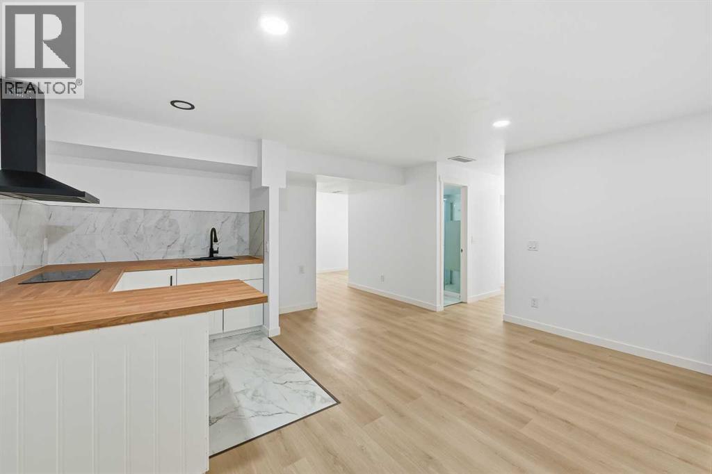 217 Coopers Grove Sw, Airdrie, Alberta  T2B 0G4 - Photo 35 - A2267001