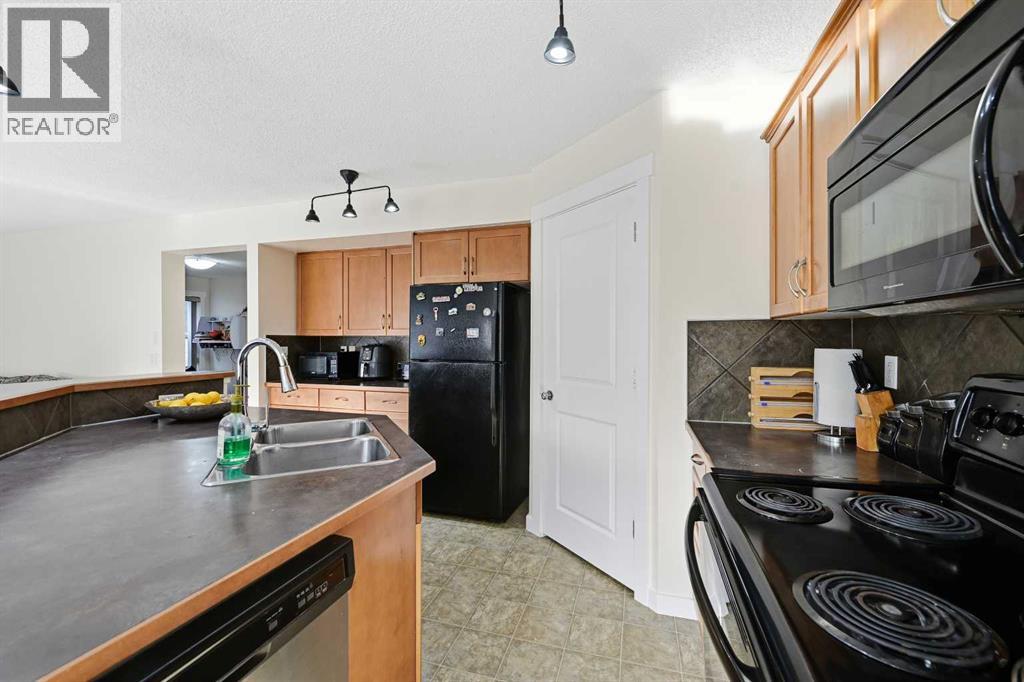 217 Coopers Grove Sw, Airdrie, Alberta  T2B 0G4 - Photo 18 - A2267001