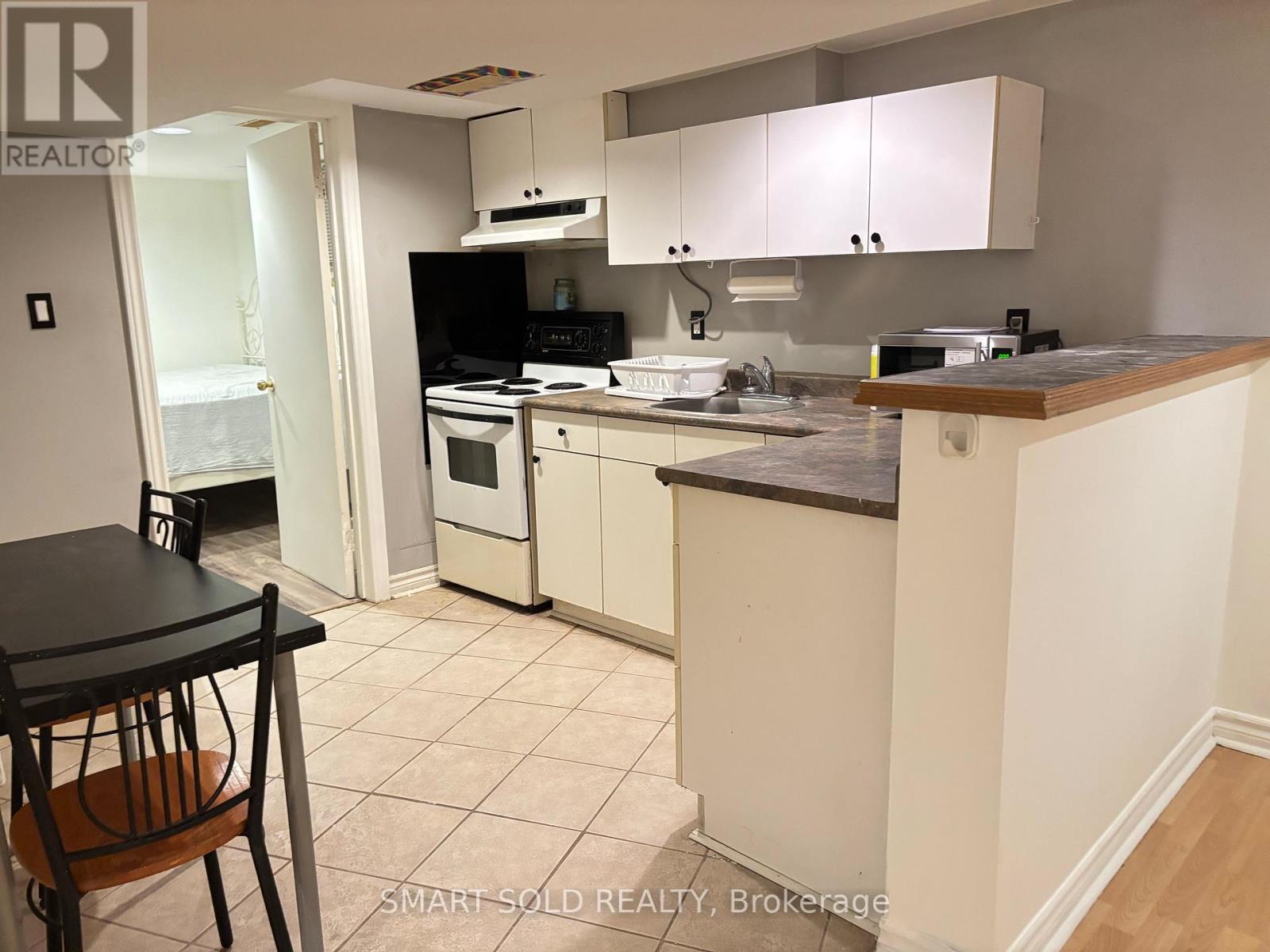 Bsmt - 51 Thirteenth Street, Toronto, Ontario  M8V 3H3 - Photo 3 - W12568918