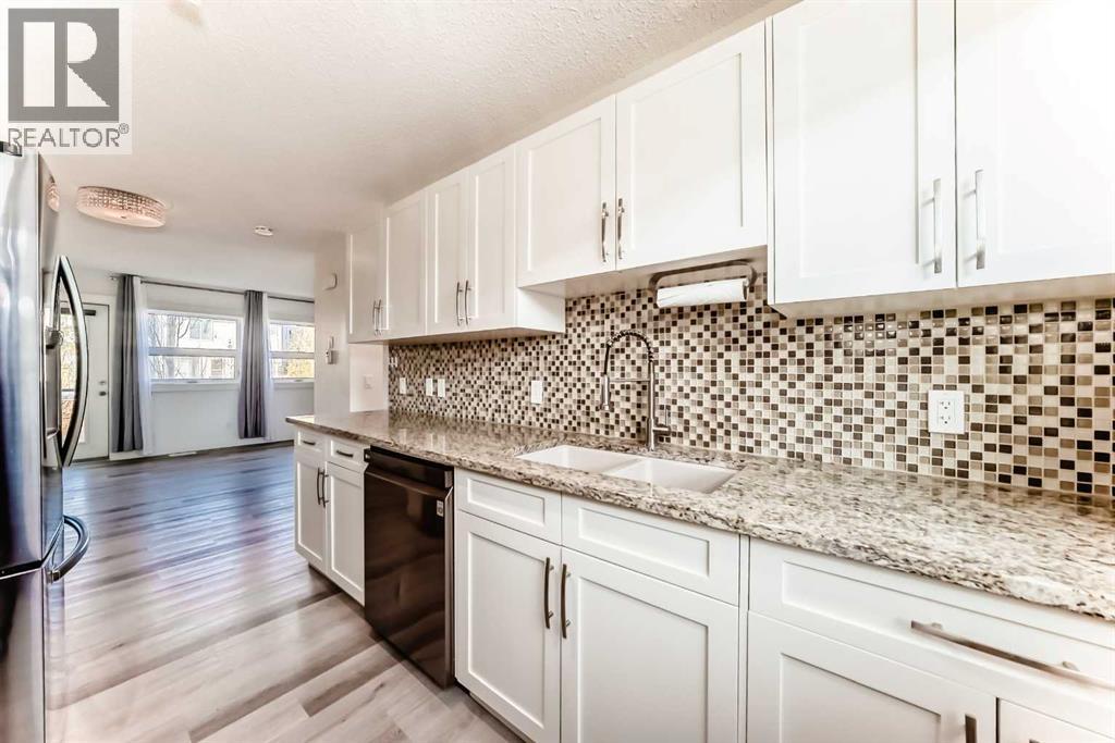 418 Covecreek Circle Ne, Calgary, Alberta  T3K 0W6 - Photo 6 - A2267603