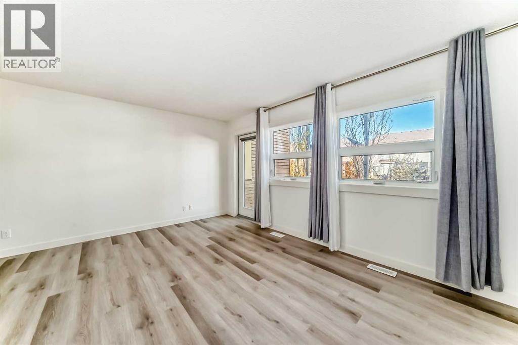 418 Covecreek Circle Ne, Calgary, Alberta  T3K 0W6 - Photo 9 - A2267603