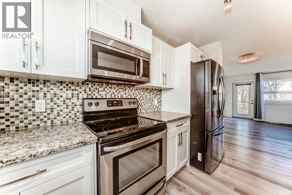 418 Covecreek Circle Ne, Calgary, Alberta  T3K 0W6 - Photo 3 - A2267603