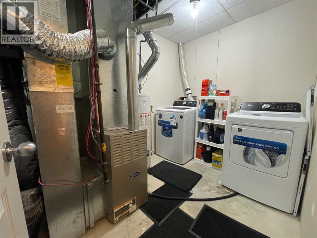 63 Glensummit Close, Cochrane, Alberta  T4C 2K1 - Photo 39 - A2265166