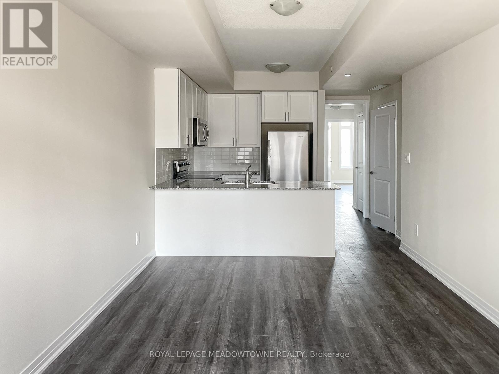 107 - 1565 Rose Way, Milton, Ontario  L9T 7E7 - Photo 3 - W12569212