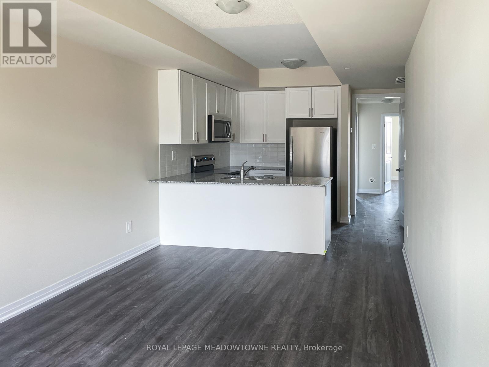 107 - 1565 Rose Way, Milton, Ontario  L9T 7E7 - Photo 4 - W12569212