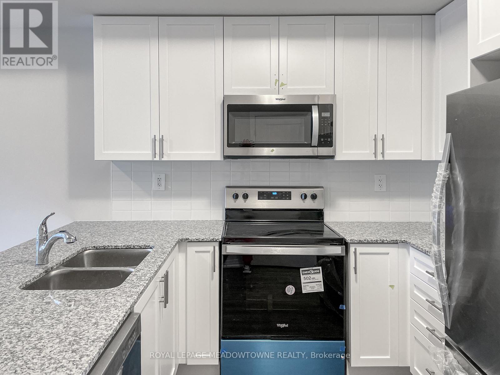 107 - 1565 Rose Way, Milton, Ontario  L9T 7E7 - Photo 5 - W12569212