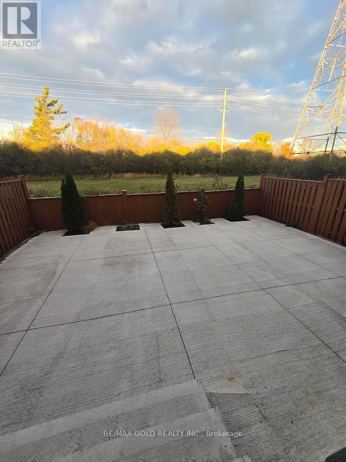 Main - 83 Kimborough Hollow E, Brampton, Ontario  L6Y 0Z1 - Photo 4 - W12569246