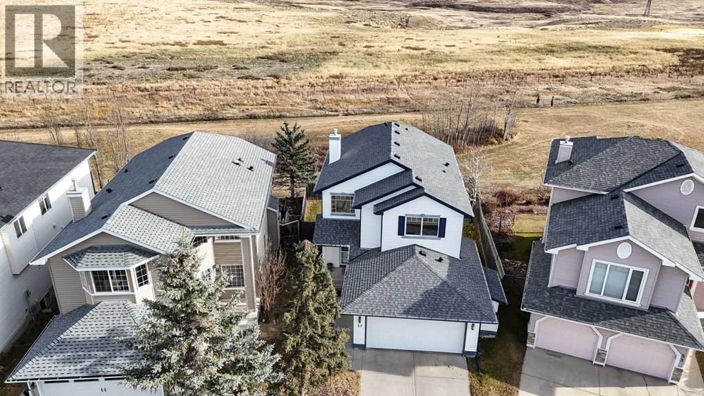 57 Coville Crescent Ne, Calgary, Alberta  T3K 5E3 - Photo 3 - A2268692