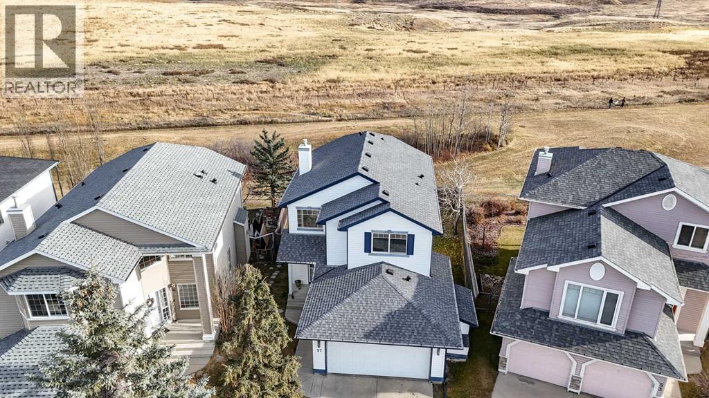 57 Coville Crescent Ne, Calgary, Alberta  T3K 5E3 - Photo 4 - A2268692