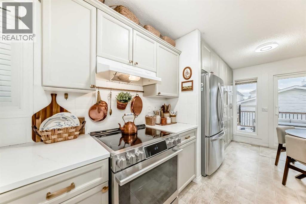 18 Crystal Shores Road, Okotoks, Alberta  T1S 2C6 - Photo 7 - A2272045