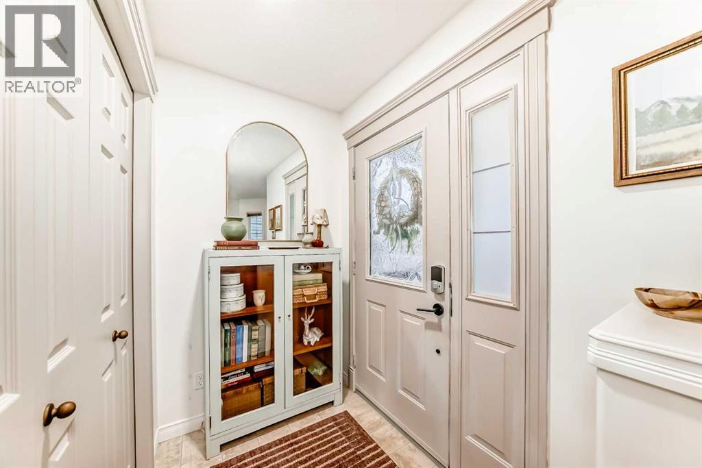 18 Crystal Shores Road, Okotoks, Alberta  T1S 2C6 - Photo 4 - A2272045