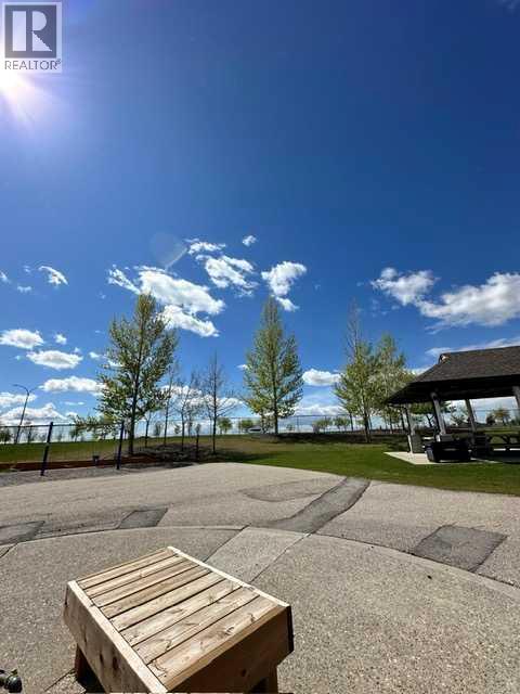 18 Crystal Shores Road, Okotoks, Alberta  T1S 2C6 - Photo 47 - A2272045