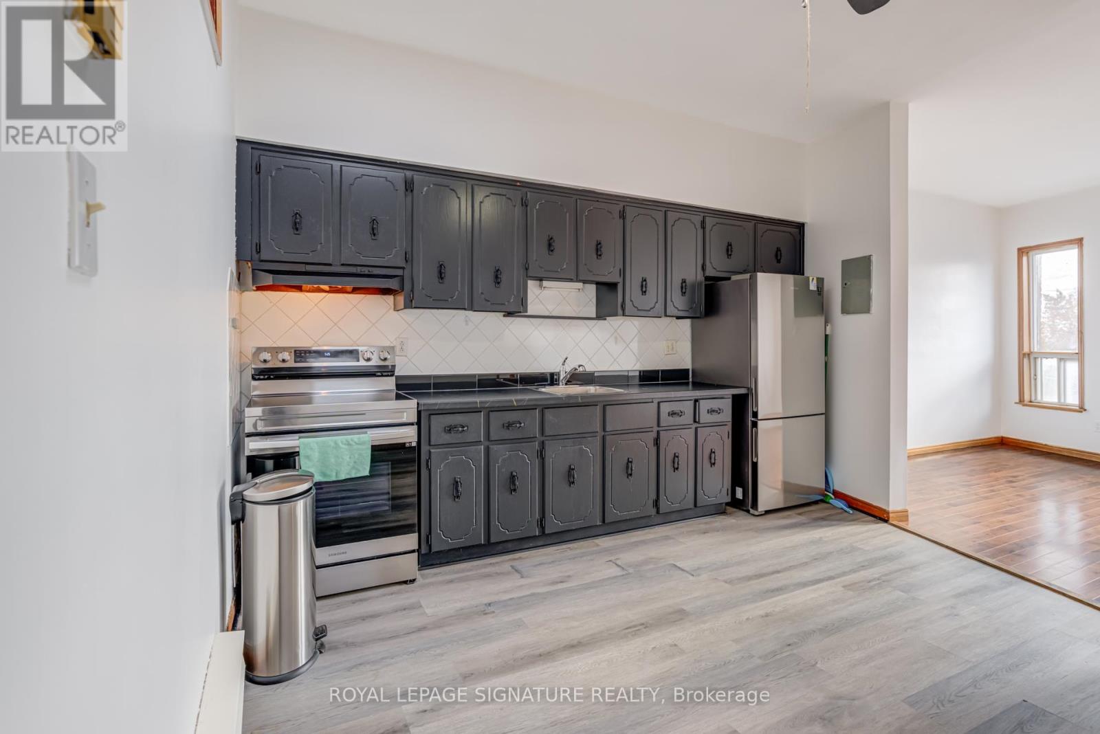 3 - 3038 Dundas Street W, Toronto, Ontario  M6P 1Z5 - Photo 2 - W12569574