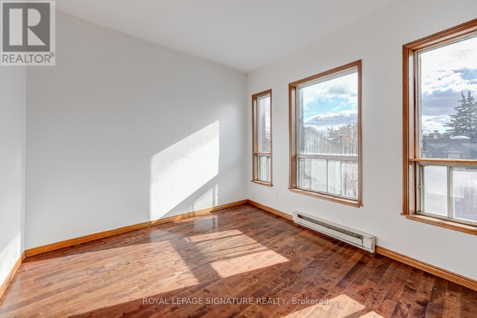 3 - 3038 Dundas Street W, Toronto, Ontario  M6P 1Z5 - Photo 3 - W12569574