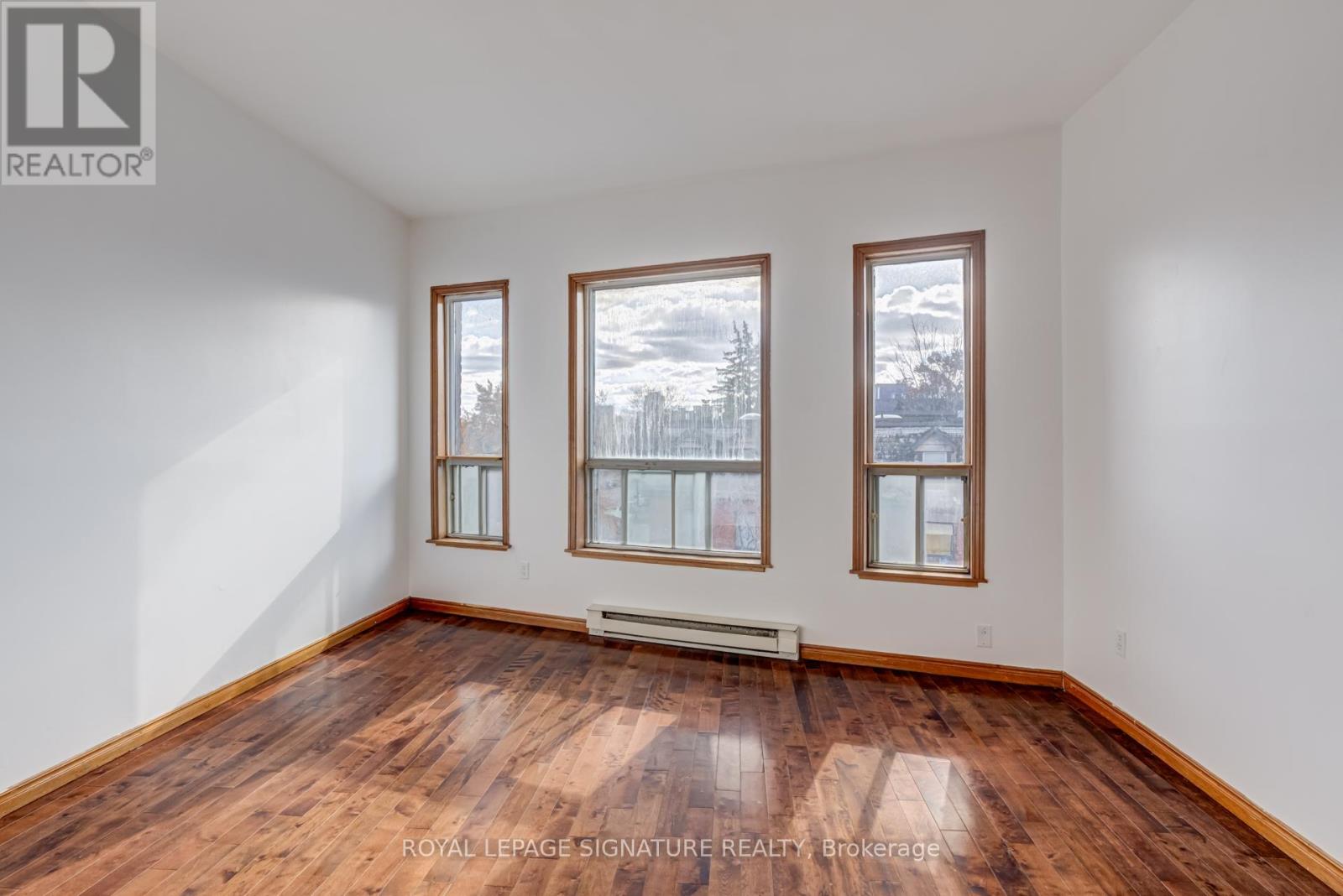 3 - 3038 Dundas Street W, Toronto, Ontario  M6P 1Z5 - Photo 4 - W12569574