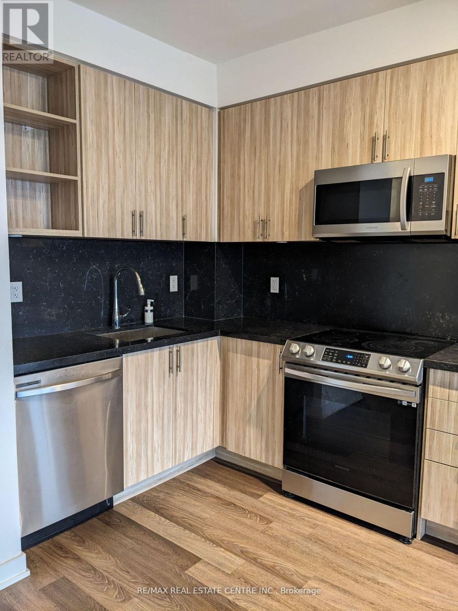 1405 - 4655 Metcalfe Avenue, Mississauga, Ontario  L5M 0Z7 - Photo 2 - W12569992