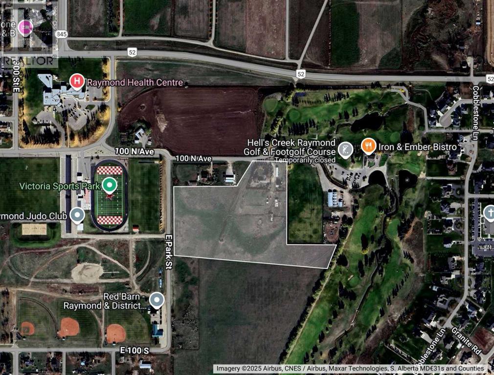 595e 100 N, Raymond, Alberta  T0K 2S0 - Photo 1 - A2271212