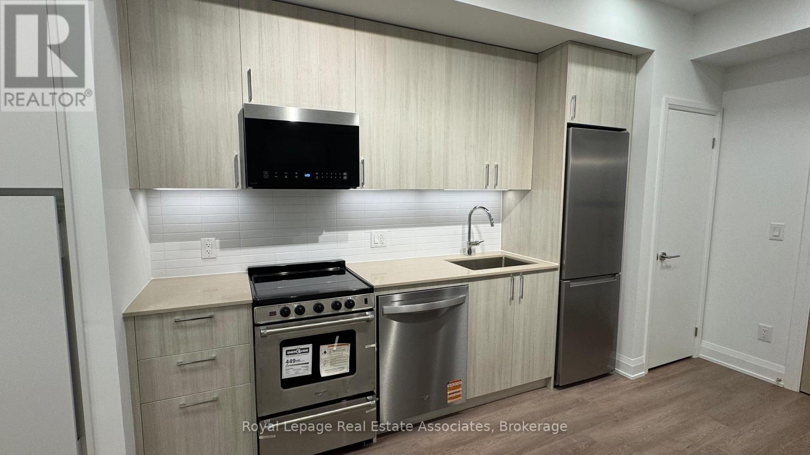 406 - 3250 Carding Mill Trail, Oakville, Ontario  L6M 1L3 - Photo 4 - W12566046