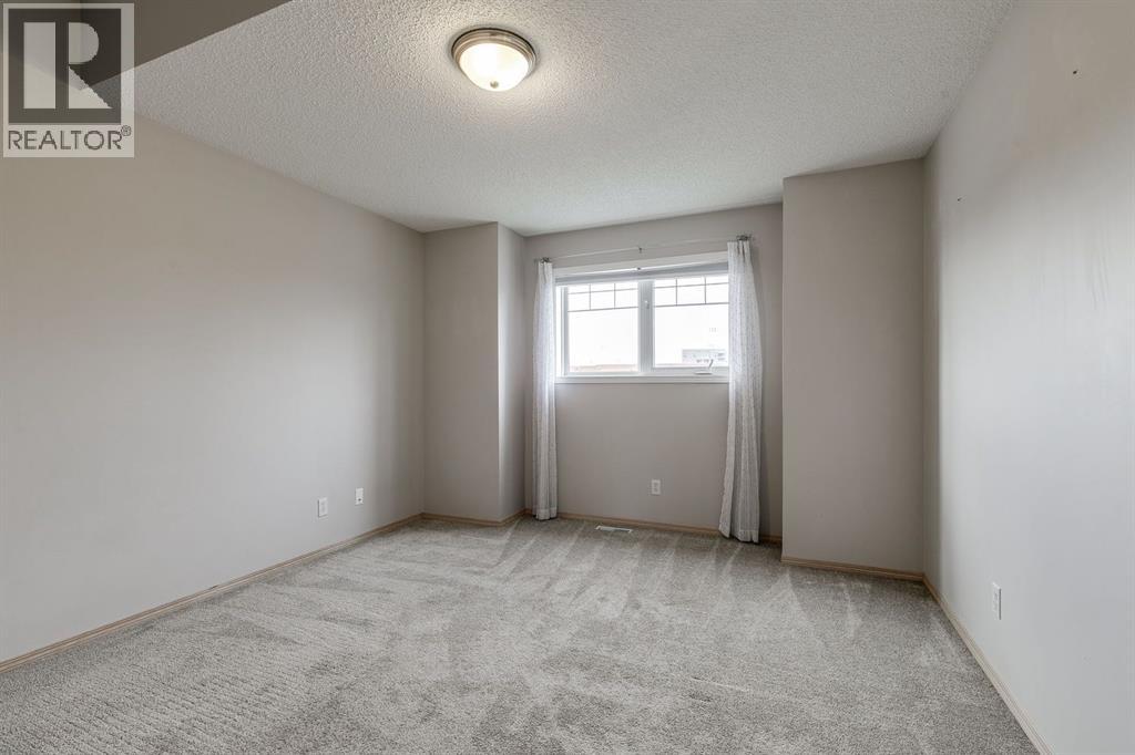 228 Woodhaven Drive, Okotoks, Alberta  T1S 1S7 - Photo 17 - A2270533