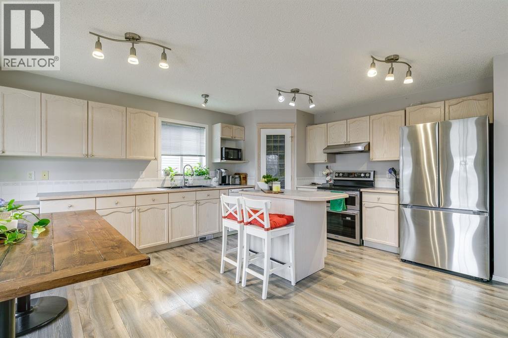 228 Woodhaven Drive, Okotoks, Alberta  T1S 1S7 - Photo 9 - A2270533