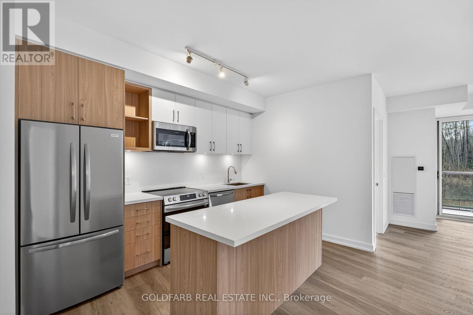 201 - 333 Sunseeker Avenue, Innisfil, Ontario  L9S 0R6 - Photo 4 - N12548808