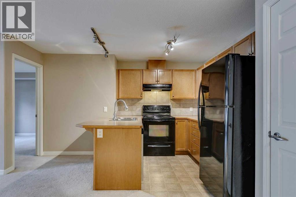 2114, 92 Crystal Shores Road, Okotoks, Alberta  T1S 2M9 - Photo 10 - A2261003