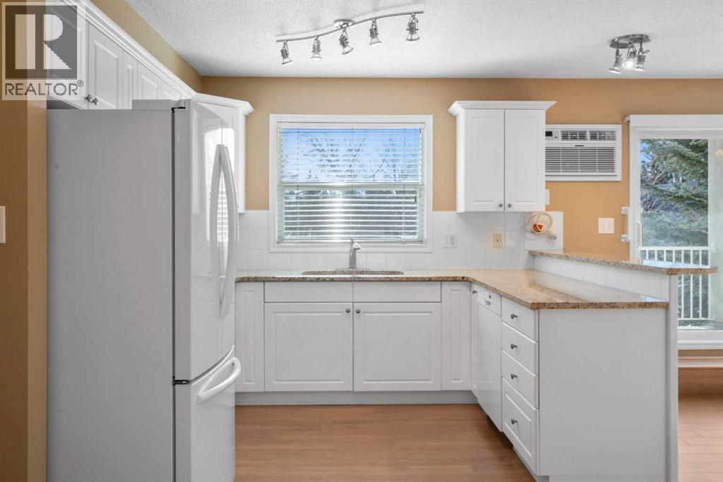 205, 6800 Hunterview Drive Nw, Calgary, Alberta  T2K 6K5 - Photo 16 - A2271987