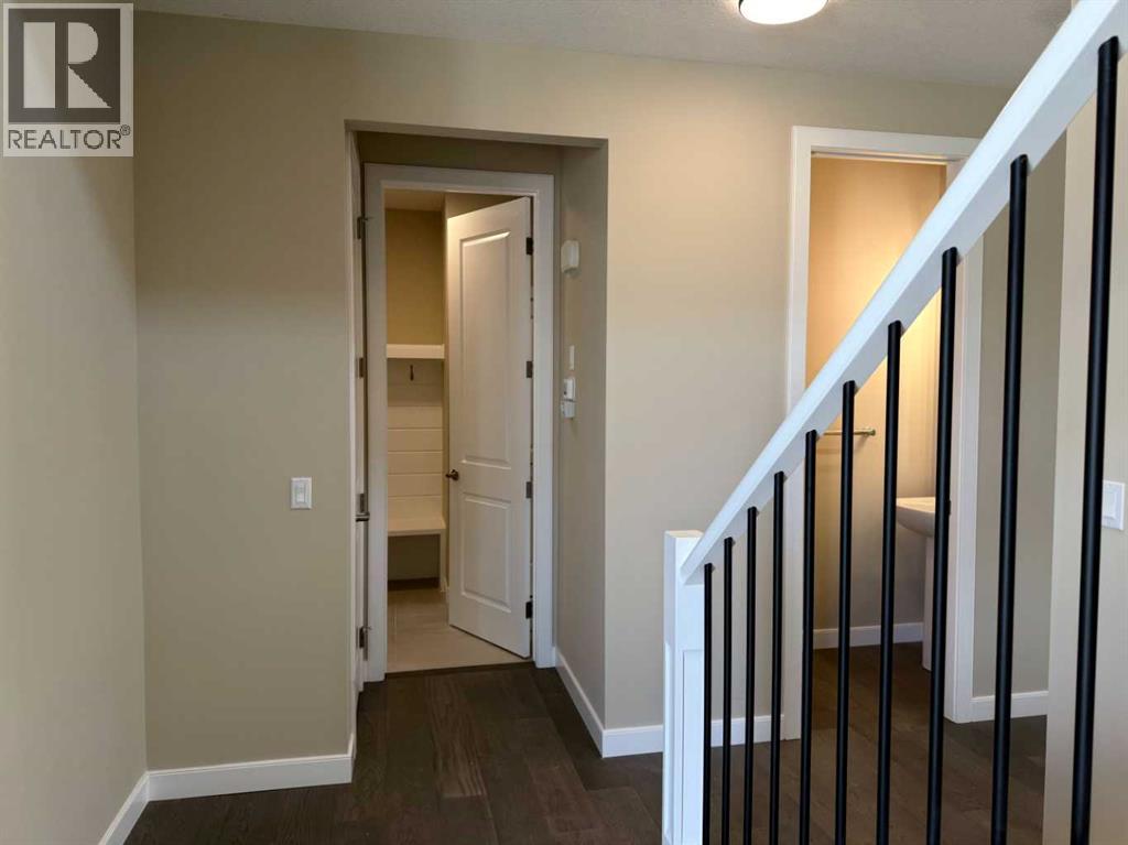 91 Sundown Crescent, Cochrane, Alberta  T4C 1Y3 - Photo 3 - A2228402