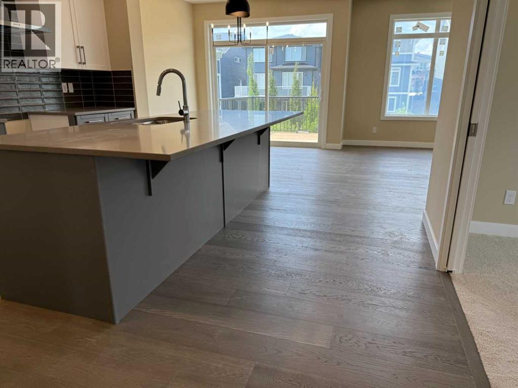 91 Sundown Crescent, Cochrane, Alberta  T4C 1Y3 - Photo 6 - A2228402