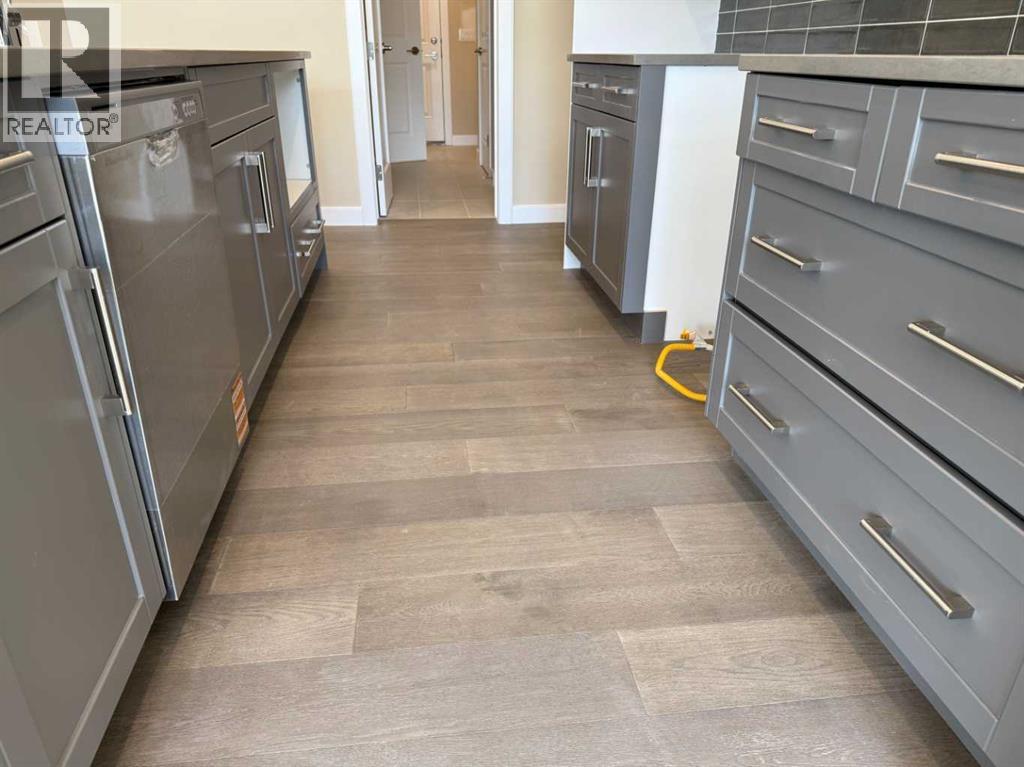 91 Sundown Crescent, Cochrane, Alberta  T4C 1Y3 - Photo 11 - A2228402