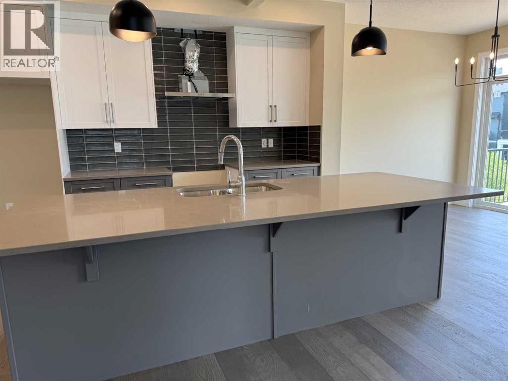 91 Sundown Crescent, Cochrane, Alberta  T4C 1Y3 - Photo 9 - A2228402