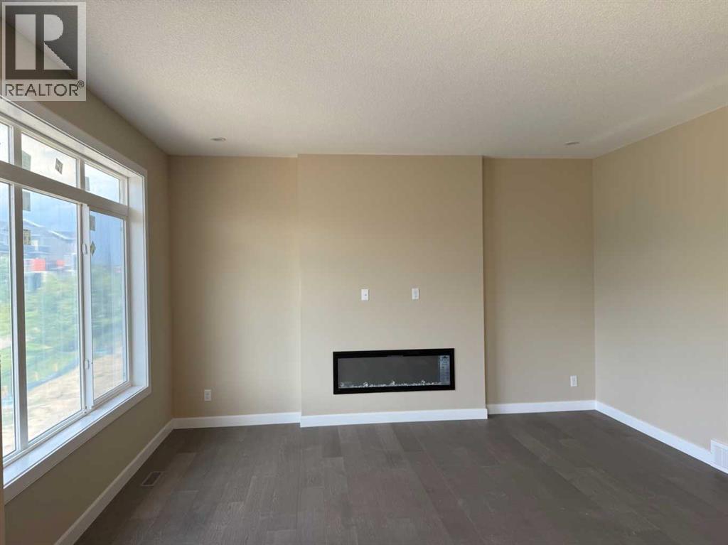 91 Sundown Crescent, Cochrane, Alberta  T4C 1Y3 - Photo 18 - A2228402