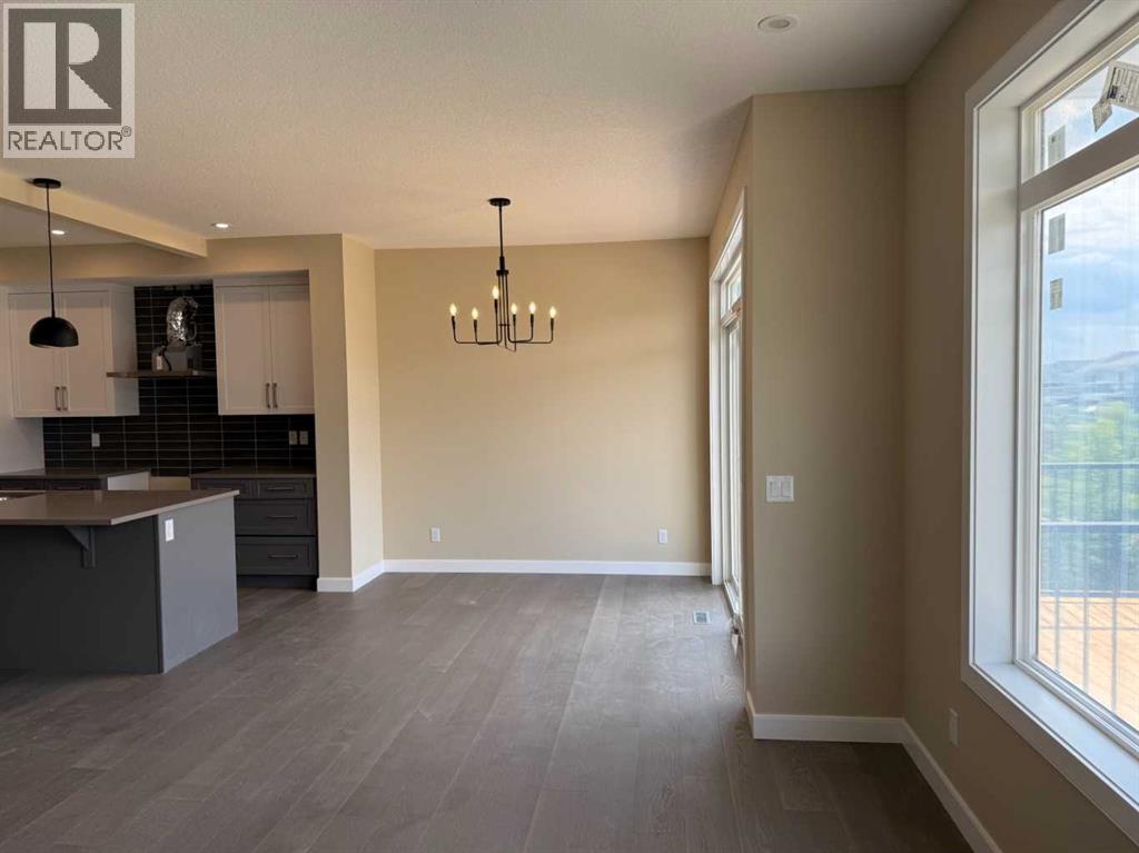 91 Sundown Crescent, Cochrane, Alberta  T4C 1Y3 - Photo 20 - A2228402